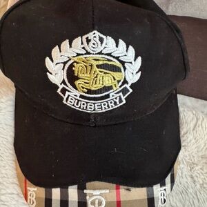 Burberry Black Hat with Gold Accent and Check Detail
